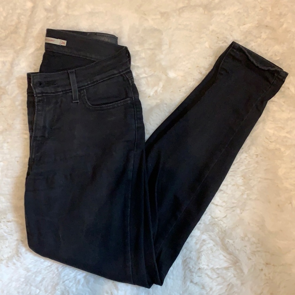 Levi’s 710 Super Skinny in faded black. Size 26.